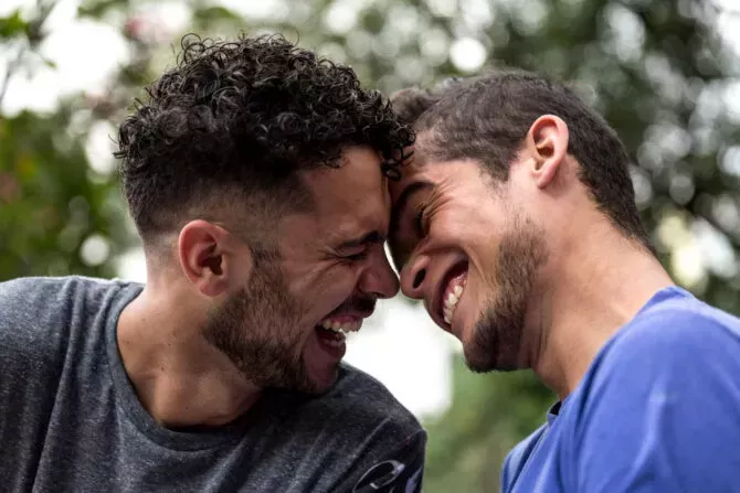 Gay couple laughing together