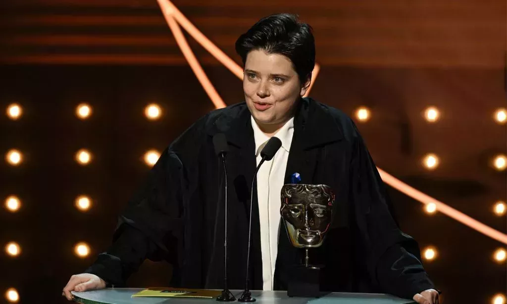 Charlotte Wells accepts BAFTA for the Outstanding debut by a British writer, director or producer award.