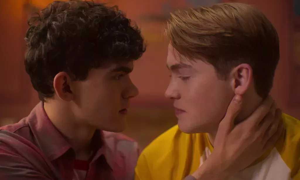 Joe Locke as Charlie and Kit Connor as Nick in Heartstopper on Netflix. Charlie and Nick about to kiss.