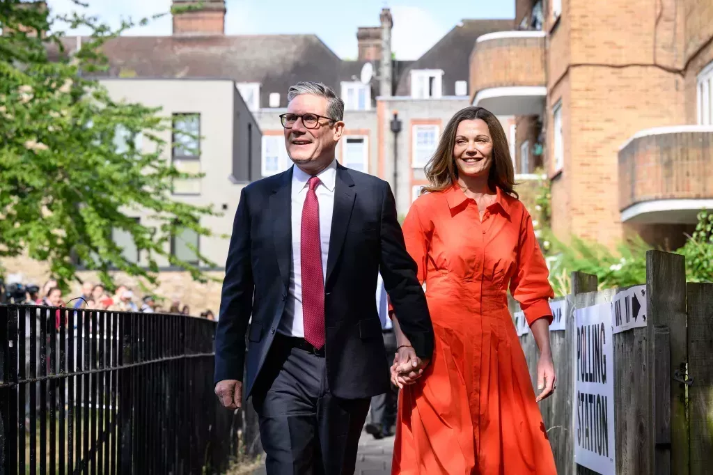 Leader of the Labour Party Keir Starmer walks with his wife Victoria Starmer