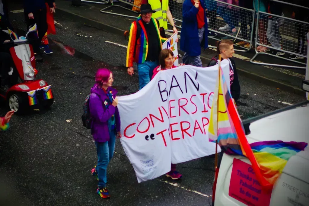 People carrying "Ban Conversion Therapy" banner at Brighton Pride Parade