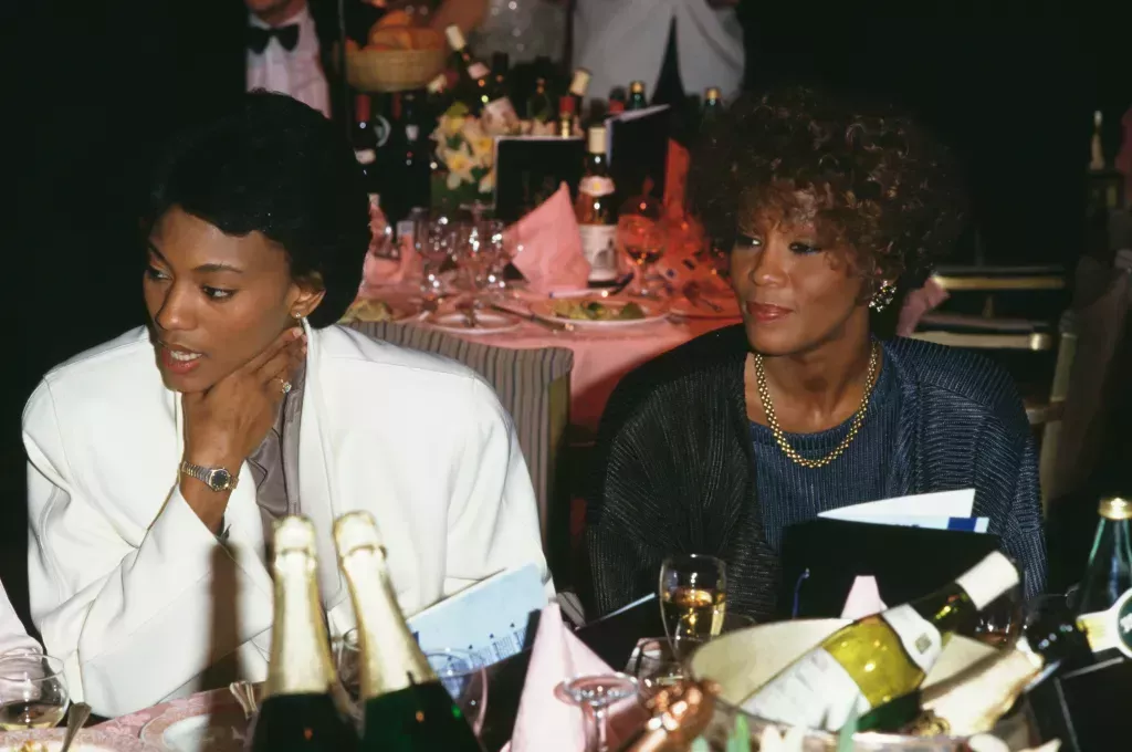 Robyn Crawford, left, and American singer Whitney Houston